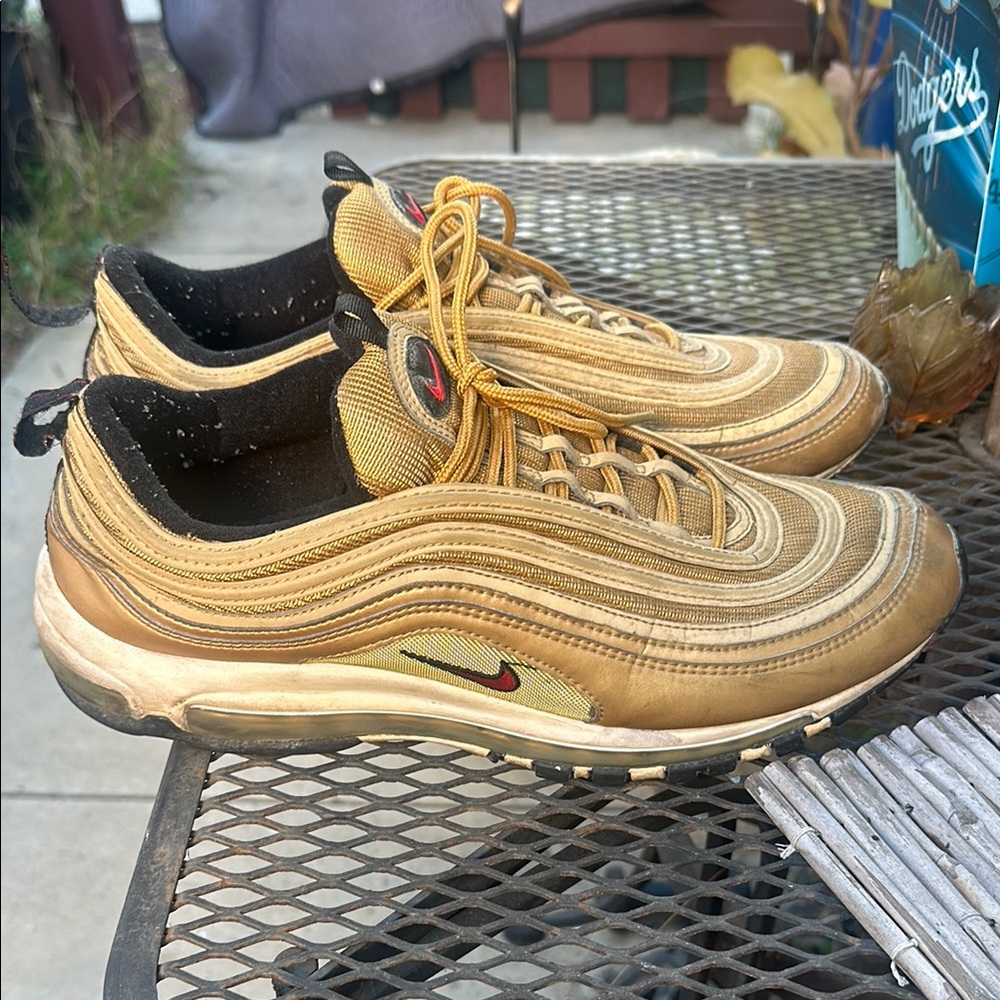 Nike Gold and Black Sneakers with Wavy Design
